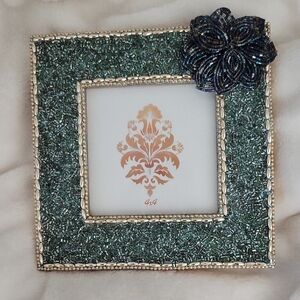 Elegant Beaded Photo Frame with Floral Accent